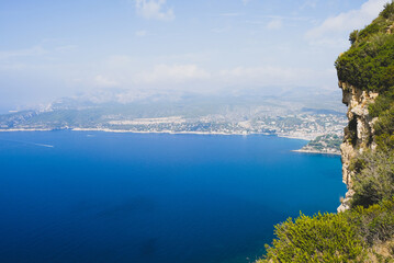 Beautiful seascape with blue sky and smooth water surface in the South of France coastal area. Popular french travel destination.