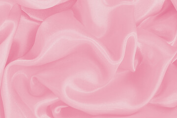 Soft pink fabric texture background, detail of silk or linen pattern.