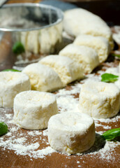 Homemade cheesecakes are ready for baking.