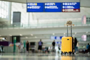 The suitcases in an empty airport hall, traveler cases in the departure airport terminal waiting for the area, vacation concept, blank space for text message or design