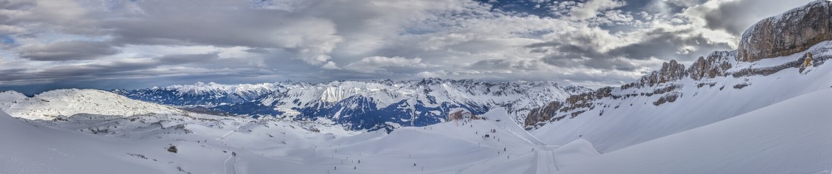 Panoramic image of a ski slope in Ifen ski resort in Kleinwalsertal valley in Austria