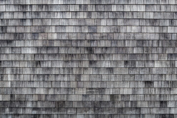 Weathered wooden shingles background. Cedar shake siding pattern for wooden texture background. Wooden roof shingles. Wood roofing pattern detail. Old grey black and white wooden roof texture. - Powered by Adobe