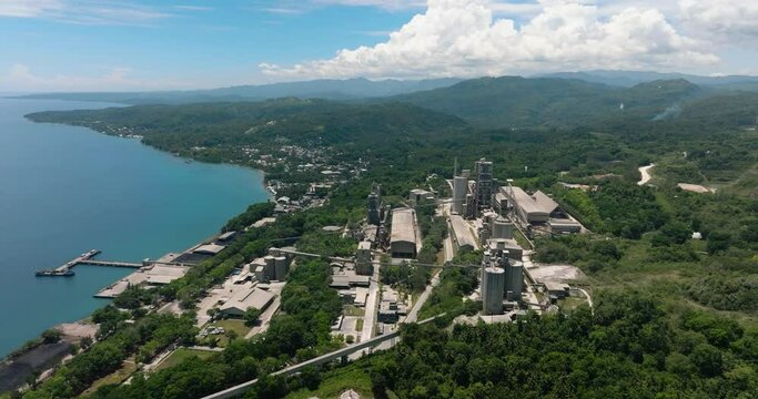 Seafront with Cement factory in Lugait, Misamis Oriental. Mindanao, Philippines.