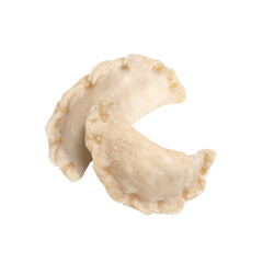 Two raw dumplings (varenyky) with cottage cheese falling on white background