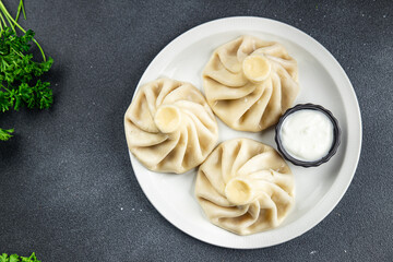 khinkali delicious dumpling stuffed with meat healthy meal food snack on the table copy space food background rustic top view