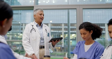 Presentation, tablet and team of doctors in meeting for planning, discussion and surgery schedule. Healthcare, hospital and men and women with boss in discussion for medical care, research or service