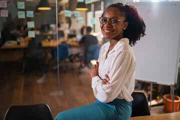 Happy businesswoman in office. Portrait of beautiful businesswoman.