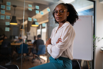 Happy businesswoman in office. Portrait of beautiful businesswoman.