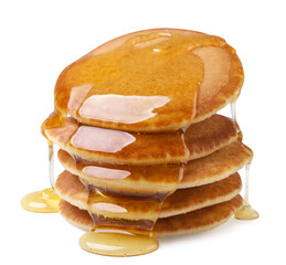 Pancakes poured with honey on a white background. Isolated