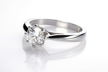 A dazzling round diamond ring on a simple band, ready to propose to the love of your life.