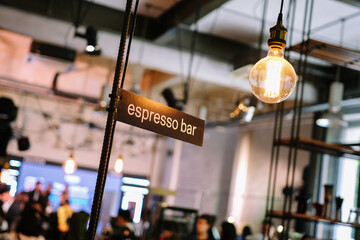 Espresso bar signs at the coffee shop. Professional coffee brewing by the barista.