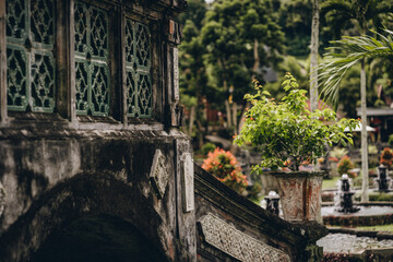 Close up shot of balinese building architecture with decorative details. Indonesian ancient old...