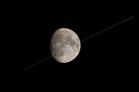 International Space Station transiting towards the moon, July 29, 2023 over Ottawa, Canada. This is a composite of 128 photos showing the path of the ISS