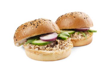Delicious sandwiches with tuna and vegetables on white background