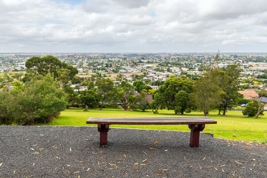 Bench with the view of Mount Gambier town from the Potters Point Lookout on a day, South Australia