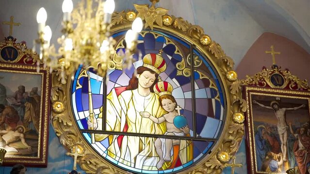Stained glass image of the Mother of God in the Church of the Nativity of the Virgin Mary on Zasavska Sveti Gora in Slovenia