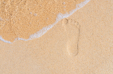 footprint on sand beach seaside 