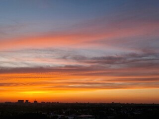 Bright beautiful sky and minimalism. City features on the horizon. Desktop background