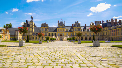 Medieval landmark - royal hunting castle Fontainbleau, France. Palace of Fontainebleau near Paris. 