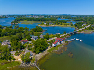 Historic waterfront house aerial view at the mouth of Piscataqua River in town of Rye with New Castle town at the background, New Hampshire NH, USA. 