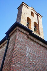 Fototapeta na wymiar Bell tower of the church of Ippolito and Biagio Saints in Castelfiorentino, Tuscany, Italy
