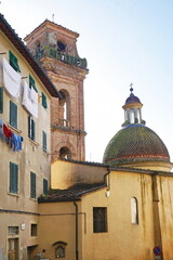 Fototapeta na wymiar Cupola and bell tower of the Collegiate Church of Saints Lorenzo and Leonardo in Castelfiorentino, Tuscany, Italy