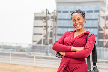 portrait of a beautiful young african business woman outdoor