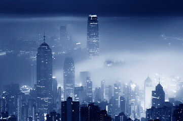 Fog over Hong Kong city at night