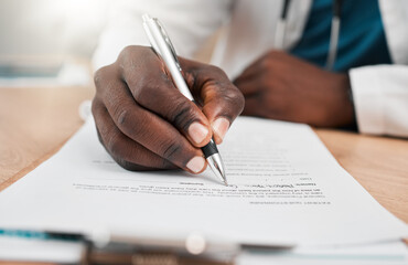 Signature, hand or doctor writing on contract hospital prescription, medical form or compliance. Closeup, application or healthcare worker with paper documents for wellness, life insurance or help