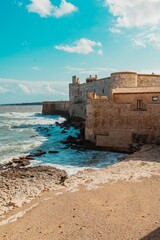 Fototapeta na wymiar High-angle view of the Castello Maniace, a historic castle in Syracuse, Sicily, Italy
