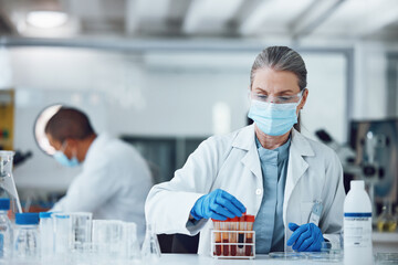 Woman, blood sample or scientist with research in a science laboratory for medical analysis or...