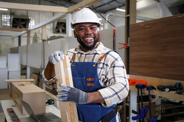 black male carpenter Professional in furniture carpentry room. New design concept in DIY workshop.