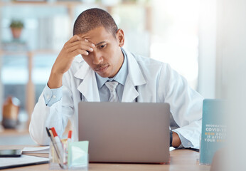 Headache, doctor and man at laptop in medical office with burnout challenge, clinic problem and stress. Frustrated healthcare worker at computer with fatigue, migraine pain and anxiety of 404 mistake