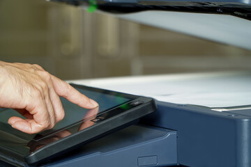 Messy man pushing hand button on panel of printer, laser printer, scanner, office, copier, initial...