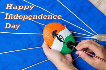 Happy Independence Day of India . Hand painting stone with flag tricolor and 