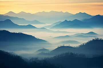 Fototapeta na wymiar Mountain silhouettes in the fog