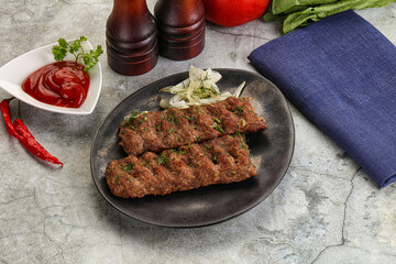 Kebab with beef served onion