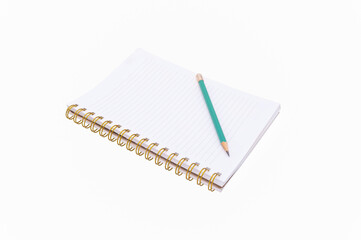 empty notebook with green pencil on white background closeup,isolated