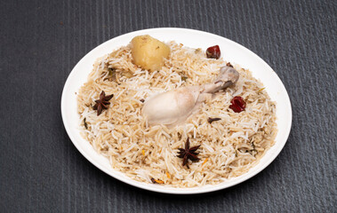 chicken biryani plate on table, chicken pulao rice