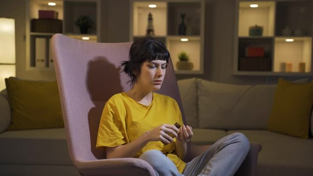 The young woman who wants to commit suicide by taking pills.