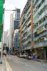 Crowded high-rise residential buildings and streets in the streets of Hong Kong