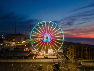 Aerial view of a ferris wheel before sunrise in Ocean City, Maryland, United States.