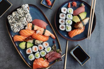Top view of a delicious and vibrant sushi platter featuring arranged in a decorative manner