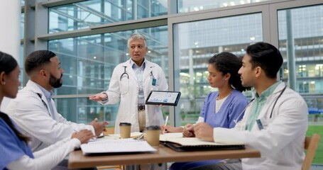 Discussion, tablet and team of doctors in meeting for planning, presentation and surgery schedule. Healthcare, hospital and men and women with boss in discussion for medical care, research or service - Powered by Adobe
