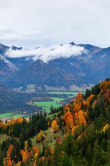 Scenic landscape of a mountain range with lush woods in autumn. Wendelstein, Bavarian Alps, Germany.
