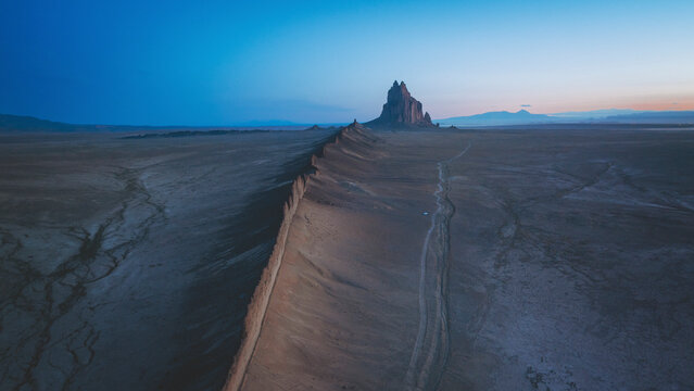 Aerial view of the famous monadnock Shiprock at sunrise, Navajo Nation, San Juan County, New Mexico, United States.