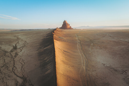 Aerial view of the famous monadnock Shiprock at sunrise, Navajo Nation, San Juan County, New Mexico, United States.