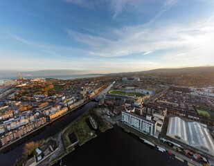 Fototapeta premium Aerial view of Dublin City with urban buildings and houses near Grand Canal