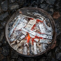a closeup of a fireplace at a camp