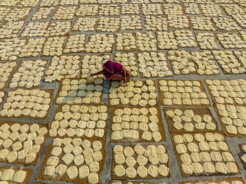 Aerial view of people working in the traditional vermicelli factory in Bogura, Bangladesh.